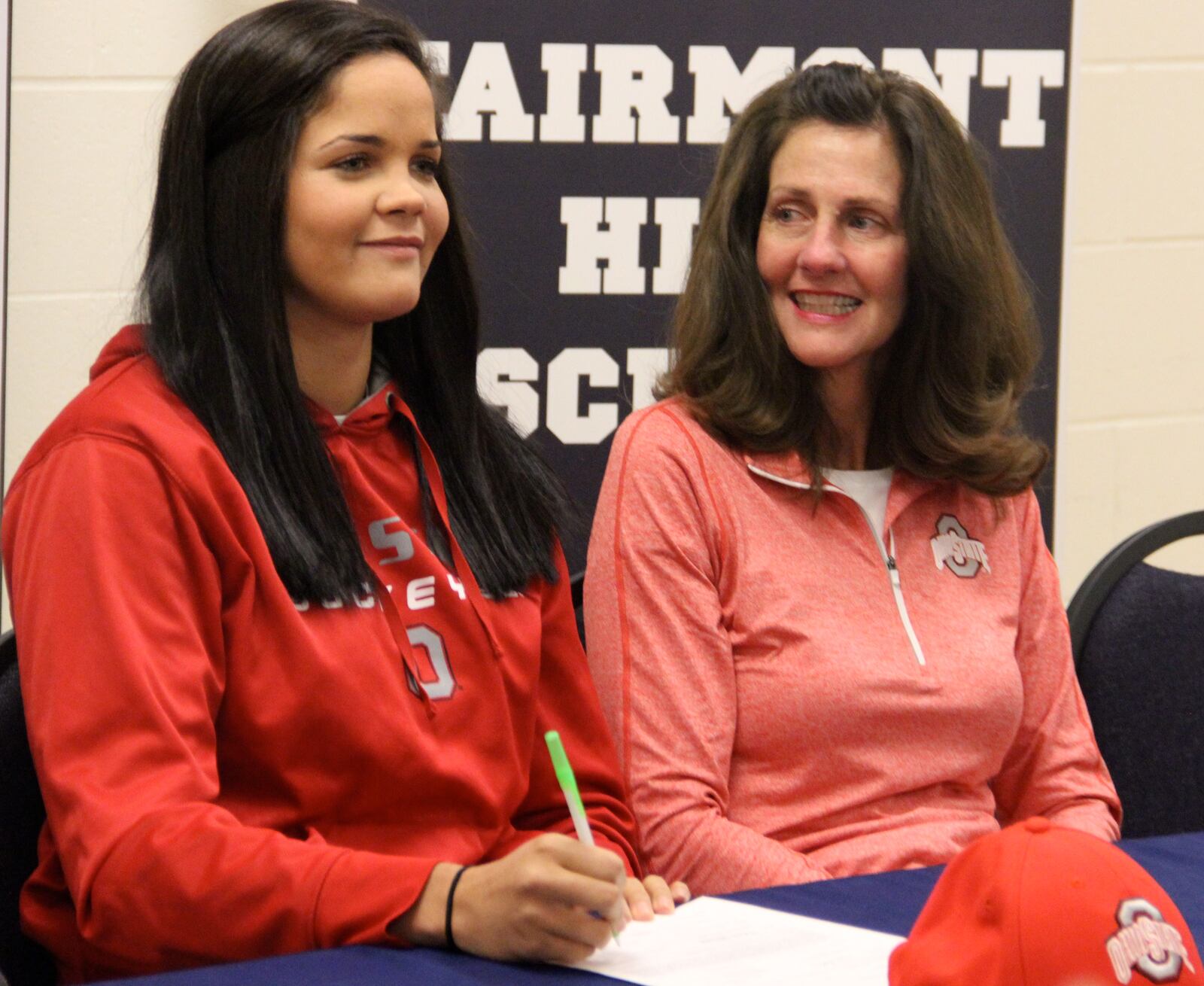 Fairmont senior forward Makayla Waterman signs her letter of intent to play basketball at The Ohio State University as her mother Julie watches at Trent Arena, on Wednesday, November 13, 2013.