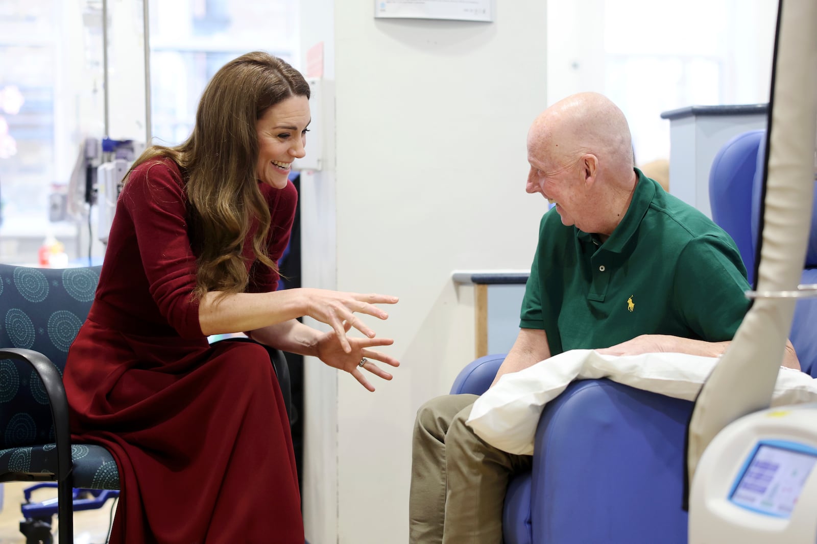 Britain's Princess Kate, left, talks with Kerr Melia during a visit to The Royal Marsden Hospital, where she received her cancer treatment, in London, Tuesday Jan. 14, 2025 in London, England. (Chris Jackson/Pool Photo via AP)