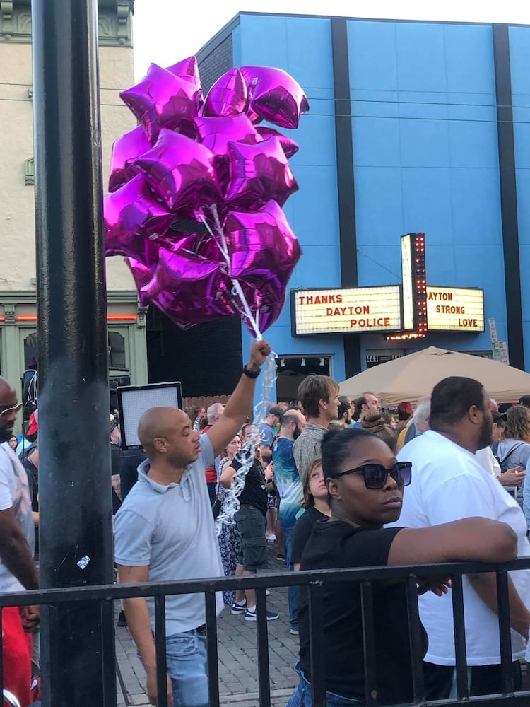 PHOTOS: Candlelight vigil in Dayton after shooting