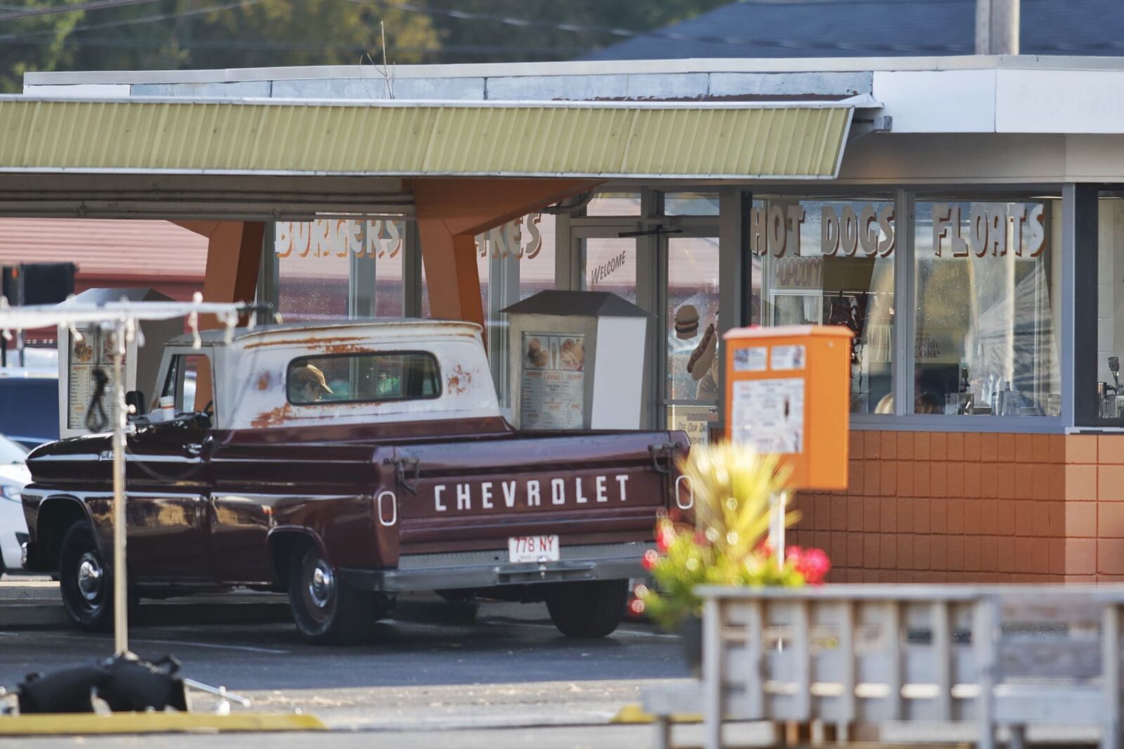 Cast and crew of "The Bikeriders" film at Jolly's root beer stand on Brookwood Avenue in Hamilton Thurs., Oct. 6, 2022. The movie has been filming in Cincinnati and is expected to film at another Hamilton location later in the month. The Bikeriders is a movie inspired by the Danny Lyon photography book of the same name set in the 1960s and follows the rise of a fictional Midwestern motorcycle club as told through its members. NICK GRAHAM/STAFF