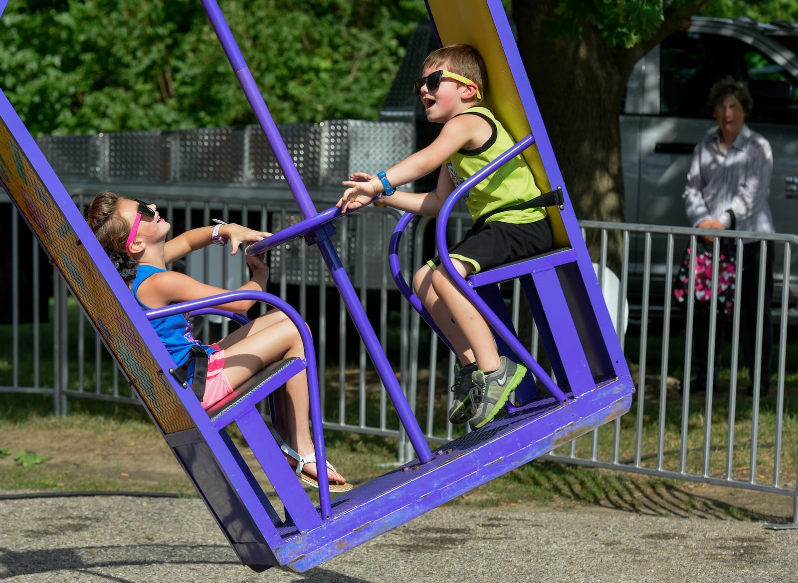 Rides are part of the fun at the Ohio Challenge Hot Air Balloon Festival. These festival-goers were photographed during the 2016 event at Smith Park in Middletown. NICK GRAHAM/STAFF