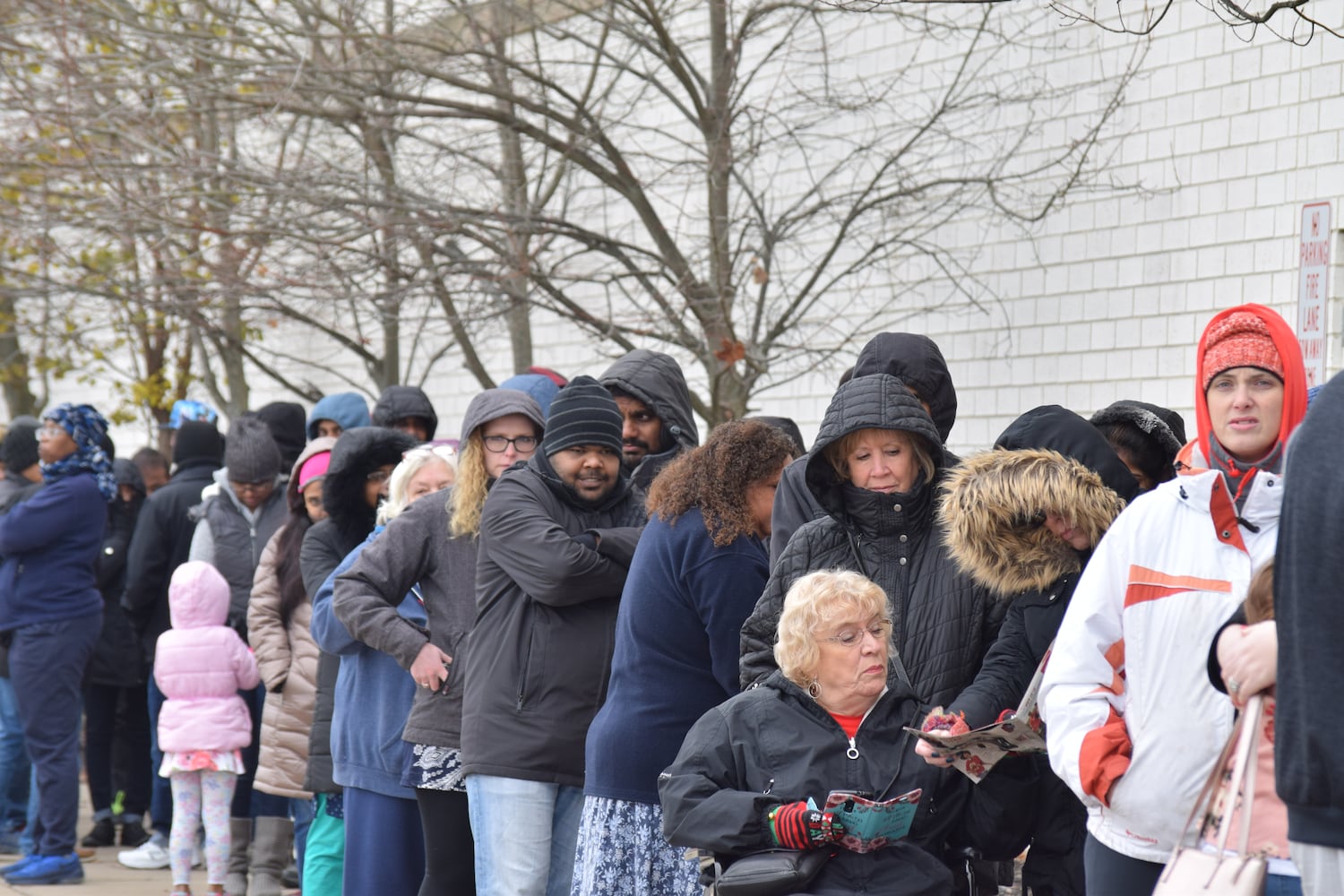 PHOTOS: Hundreds like up outside JCPenney for doorbusters, coupons