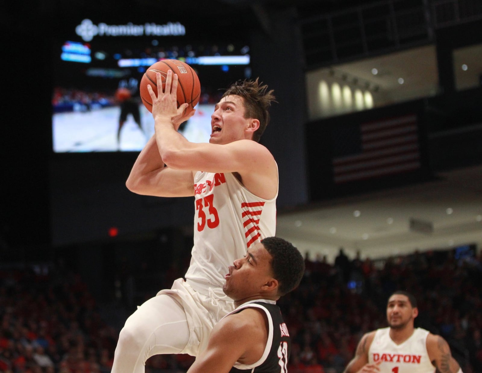 Dayton’s Ryan Mikesell scores against Omaha on Tuesday, Nov. 19, 2019, at UD Arena. David Jablonski/Staff