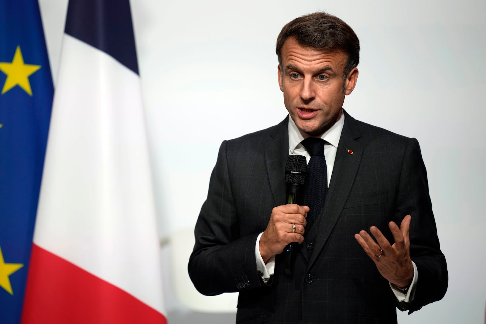 FILE - French President Emmanuel Macron delivers a speech after inaugurating the Fabriqué en France (Made in France) exhibition at the Elysee Palace in Paris, Friday, Oct. 25, 2024. (AP Photo/Louise Delmotte, Pool, File)