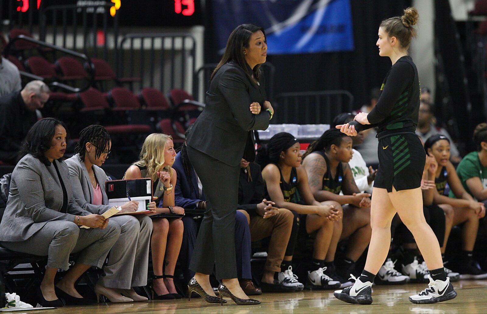 Wright State’s Emily Vogelpohl talks to coach Katrina Merriweather during Friday’s NCAA Tournament game at Texas A&M. Robert Franklin/CONTRIBUTED