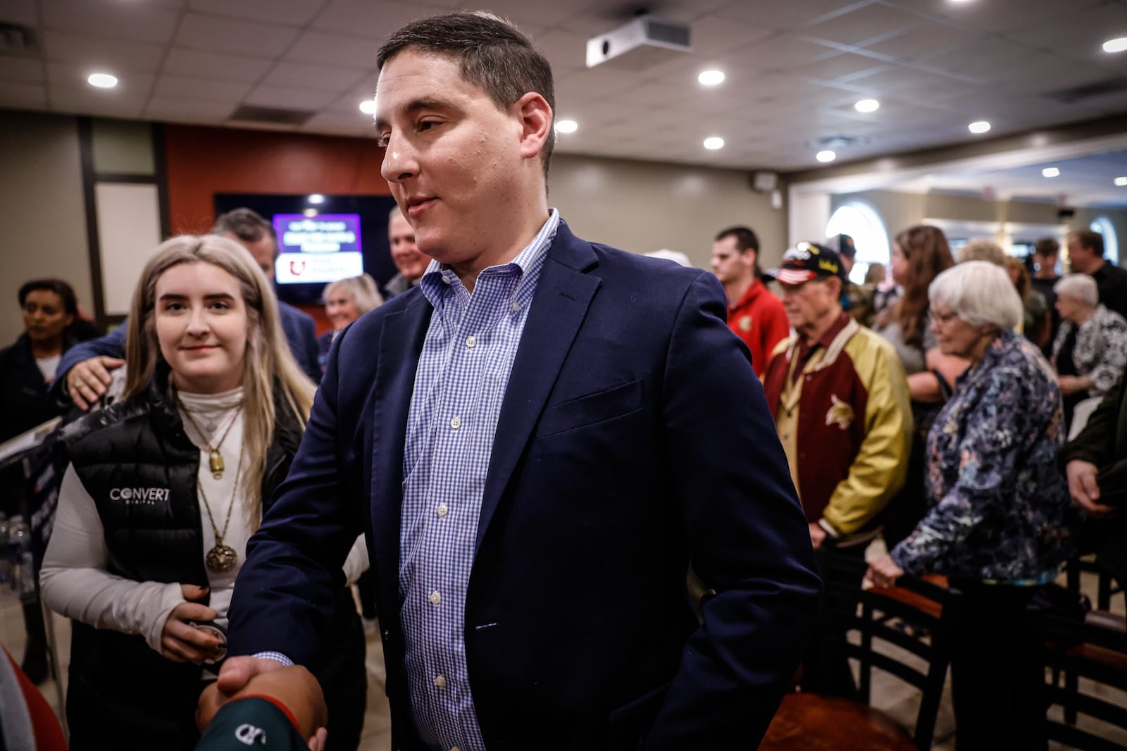 Ohio U.S. Senate candidate, Josh Mandel meets supporters during a campaign stop at Victory Christian Church in Kettering.  Sen. Ted Cruz, R-Tx also joined Mandel at the event. JIM NOELKER/STAFF