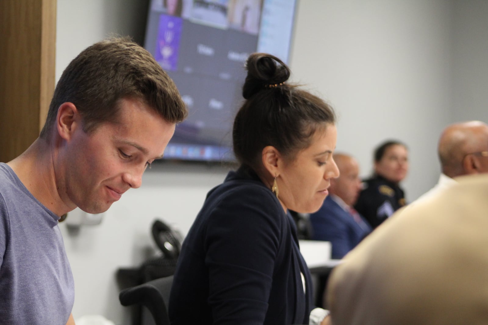 Angelina Jackson and Jacob Wourms, chair and vice chair of the Use of Force Committee, at a meeting in 2022. Jackson stepped down from the committee, which has not met since November of last year. CORNELIUS FROLIK / STAFF