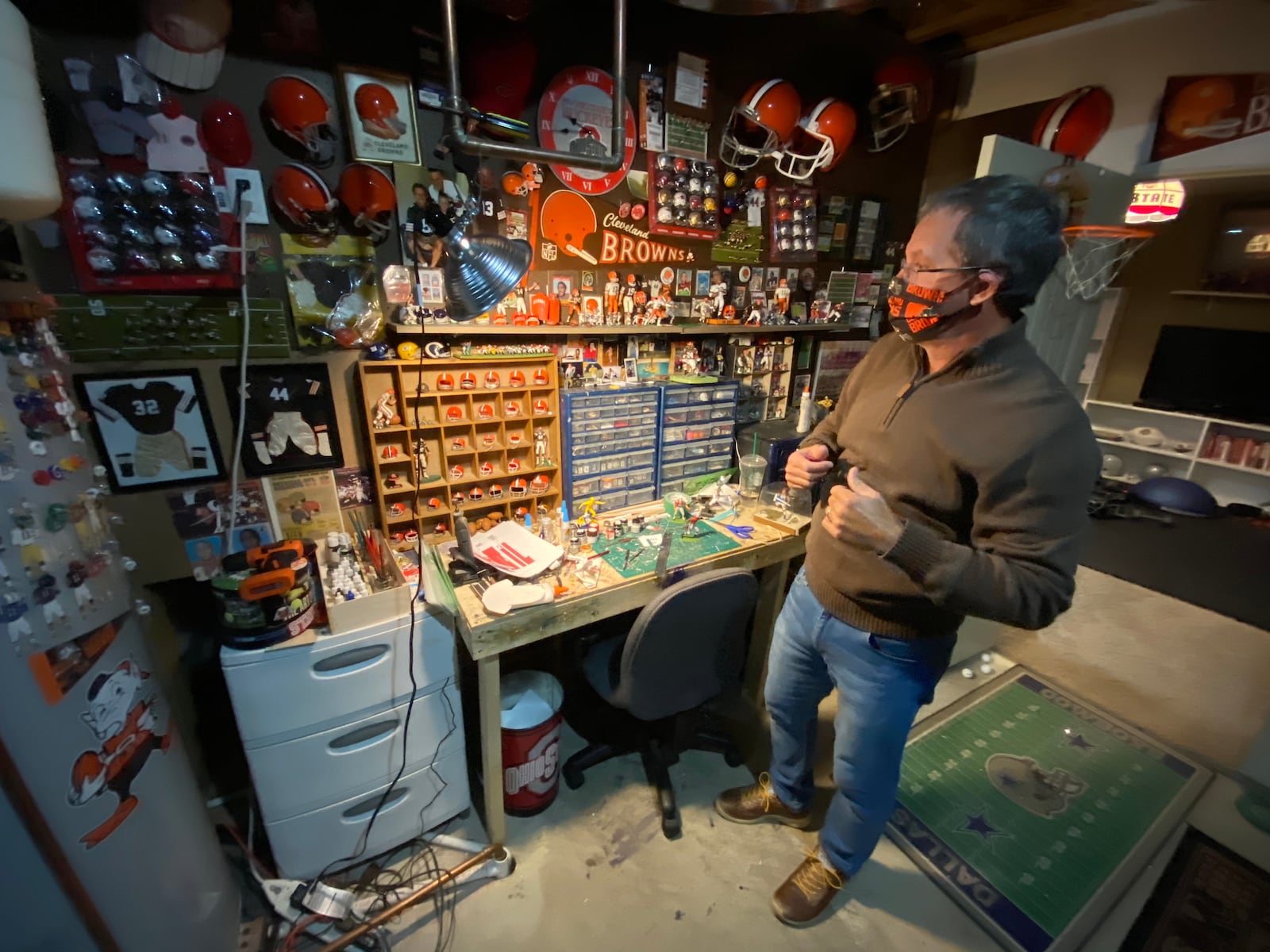 Charlie McMahan, senior pastor at Southbrook Christian Church in Miamisburg, has repurposed or enhanced thousands of items on display in the basement of his Centerville home. This is his work area. STEVE MORRISON/CONTRIBUTED