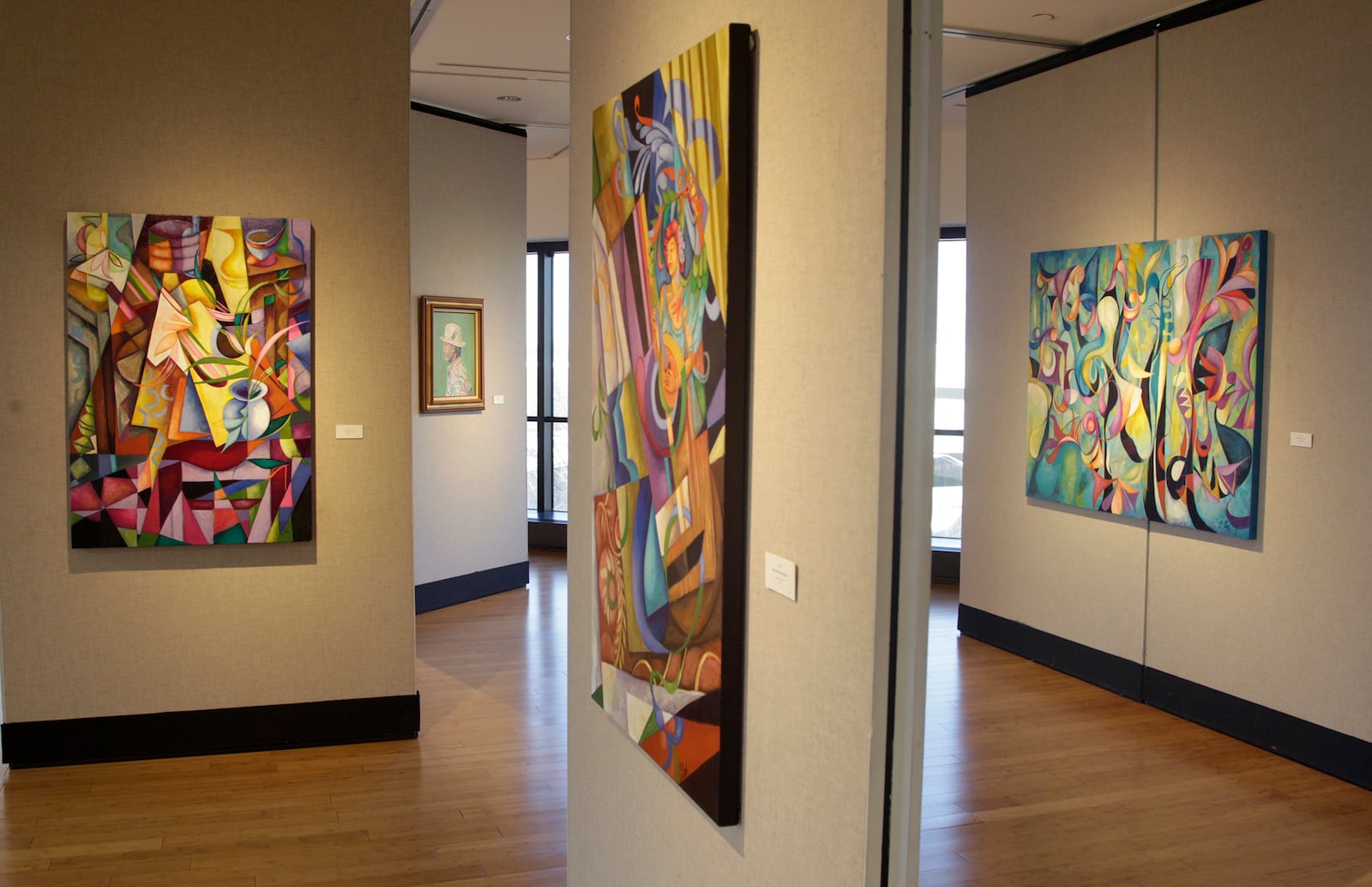 âStories,â the work of four regional painters, Cedric Cox, Jean Koeller, Morris Howard and Ann Kim, is on display in the Burnell R. Roberts Triangle Gallery at Sinclair Community College. LISA POWELL / STAFF