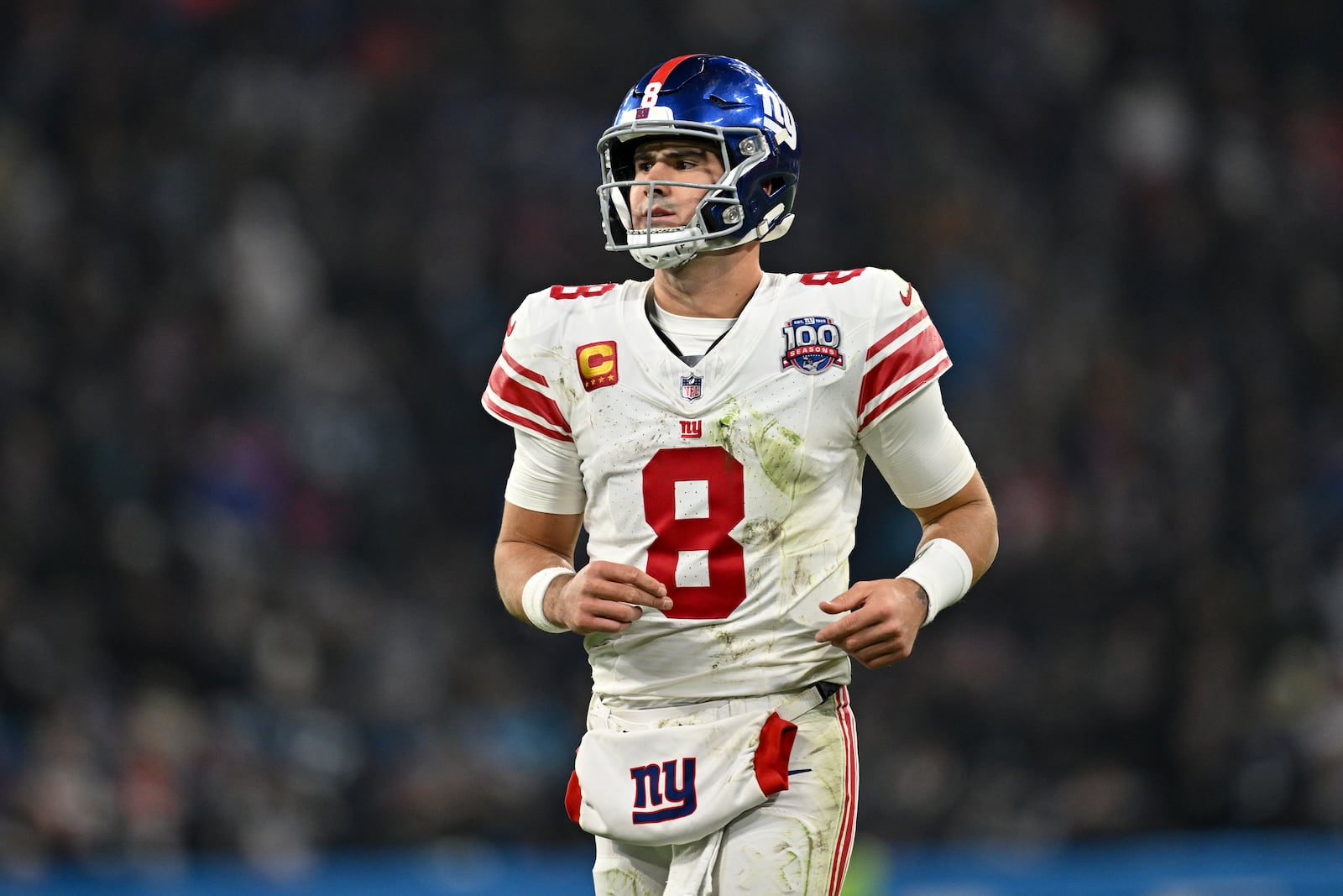 New York Giants quarterback Daniel Jones watches during the second half of an NFL football game against the Carolina Panthers, Sunday, Nov. 10, 2024, in Munich, Germany. (AP Photo/Lennart Preiss)