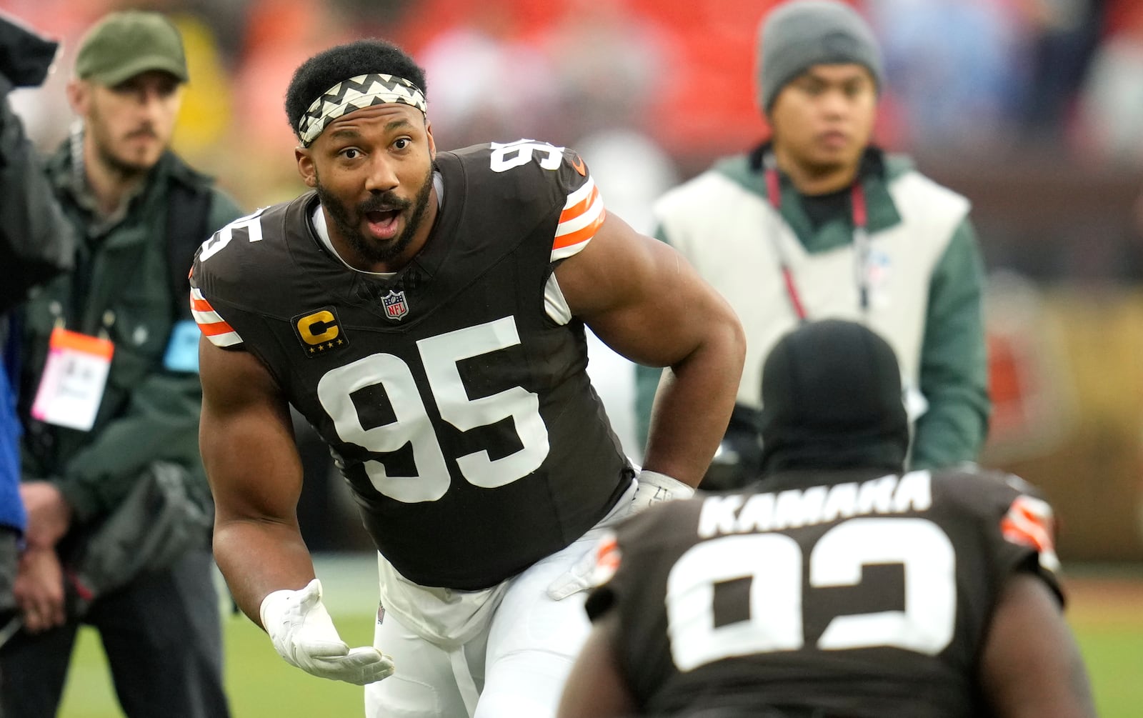 Cleveland Browns defensive end Myles Garrett (95) runs drills before an NFL football game against the Miami Dolphins Sunday, Dec. 29, 2024, in Cleveland. (AP Photo/Sue Ogrocki)