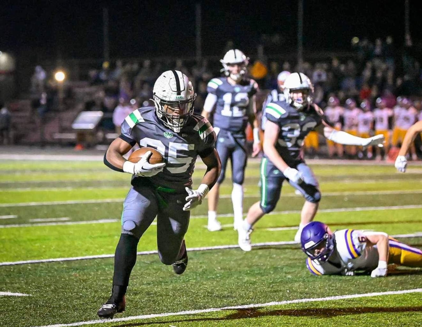 Badin's Lem Grayson (25) carries the ball against Bellbrook on Friday, Nov. 3, 2023. Betsey Miyahara/CONTRIBUTED