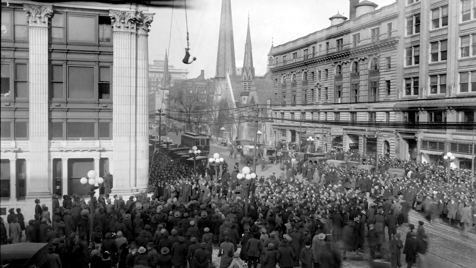 In 1916 magician Harry Houdini escaped from a police straight jacket while suspended from the Dayton Daily News building head down. The newspaper reported it took him just three minutes to free himself. DAYTON HISTORY MAYFIELD COLLECTION