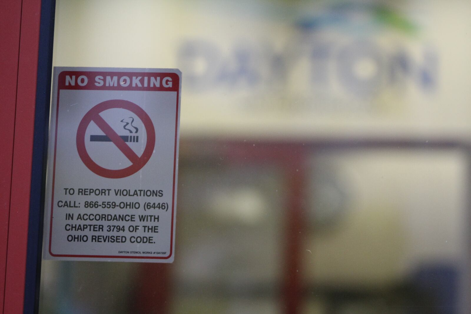 A no-smoking sign is posted on the entrance doors to City Hall. CORNELIUS FROLIK / STAFF