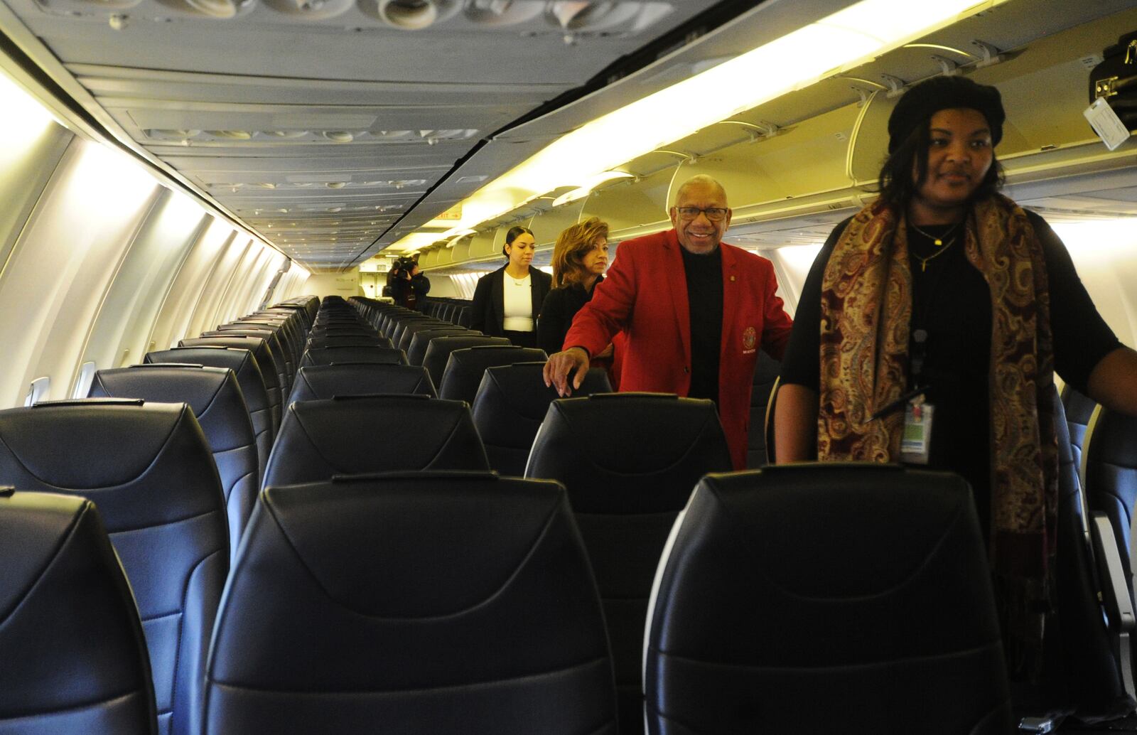 Dayton Mayor Jeffrey Mims checks out an Avelo plane at the Dayton International Airport. Avelo Airlines celebrated its first flight from Dayton on Friday Jan. 13, 2023. MARSHALL GORBY\STAFF