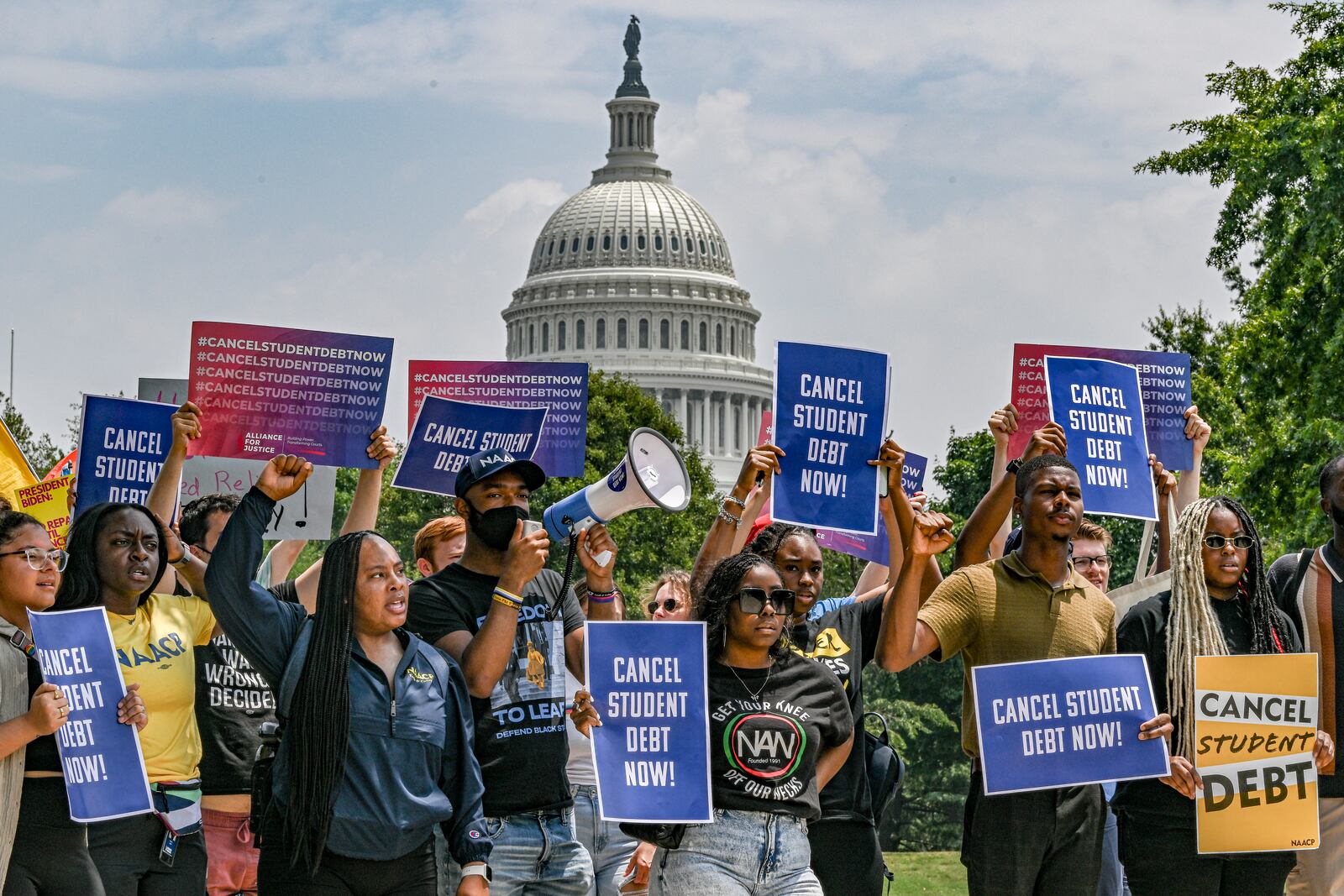 
                        FILE — Demonstrators calling for the cancellation of student debt, in Washington, June 30, 2023. The Biden administration’s new income-driven repayment plan, SAVE, will reduce payments for millions of borrowers and more will qualify for $0 payments. (Kenny Holston/The New York Times)
                      