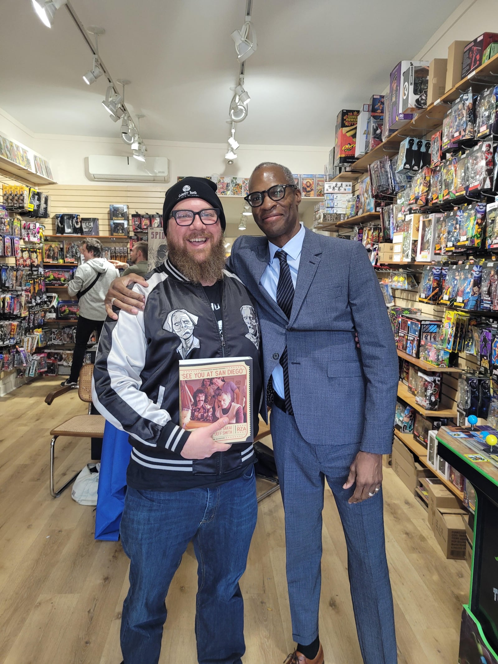 Mathew Klickstein, left, with interviewee/contributor Ho Che Anderson at Silver Snail Comics in Toronto this month. CONTRIBUTED