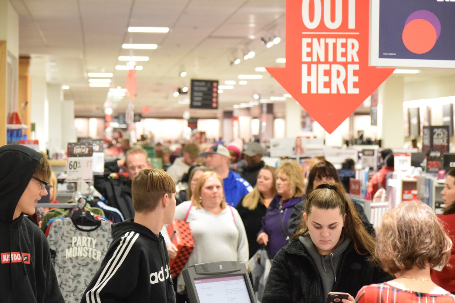 PHOTOS: Hundreds like up outside JCPenney for doorbusters, coupons