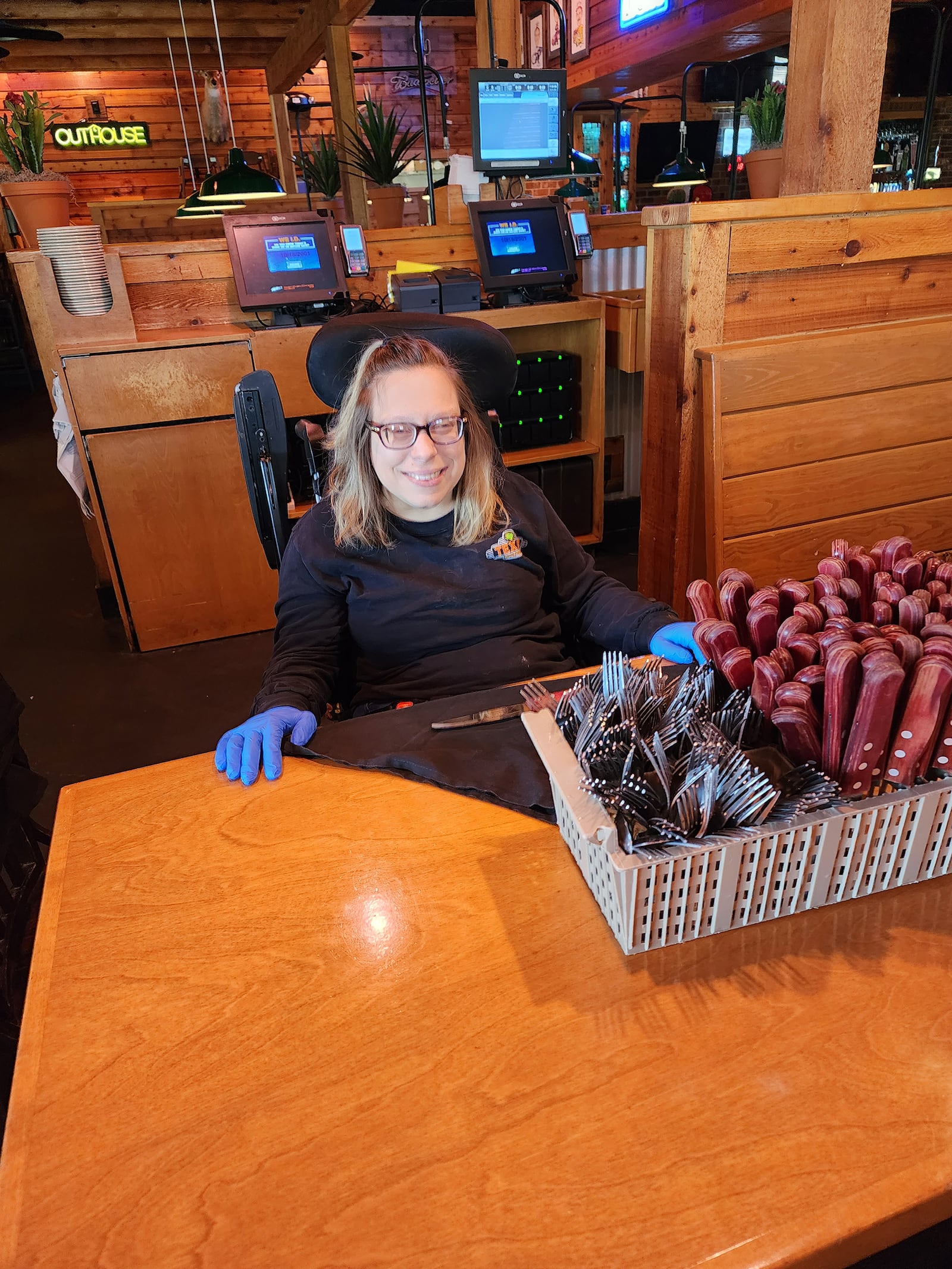 Amy Zahora found her dream job as a silverware roller at Texas Roadhouse in Fairborn after working with Boundless, a Dayton based organization that helps people with developmental and intellectual disabilities create "boundless" lives and learn to live independently.