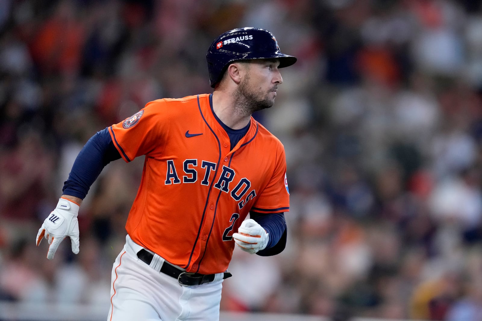 Houston Astros' Alex Bregman sprints to first after hitting for a single against the Detroit Tigers in the second inning of Game 2 of an AL Wild Card Series baseball game Wednesday, Oct. 2, 2024, in Houston. (AP Photo/Kevin M. Cox)