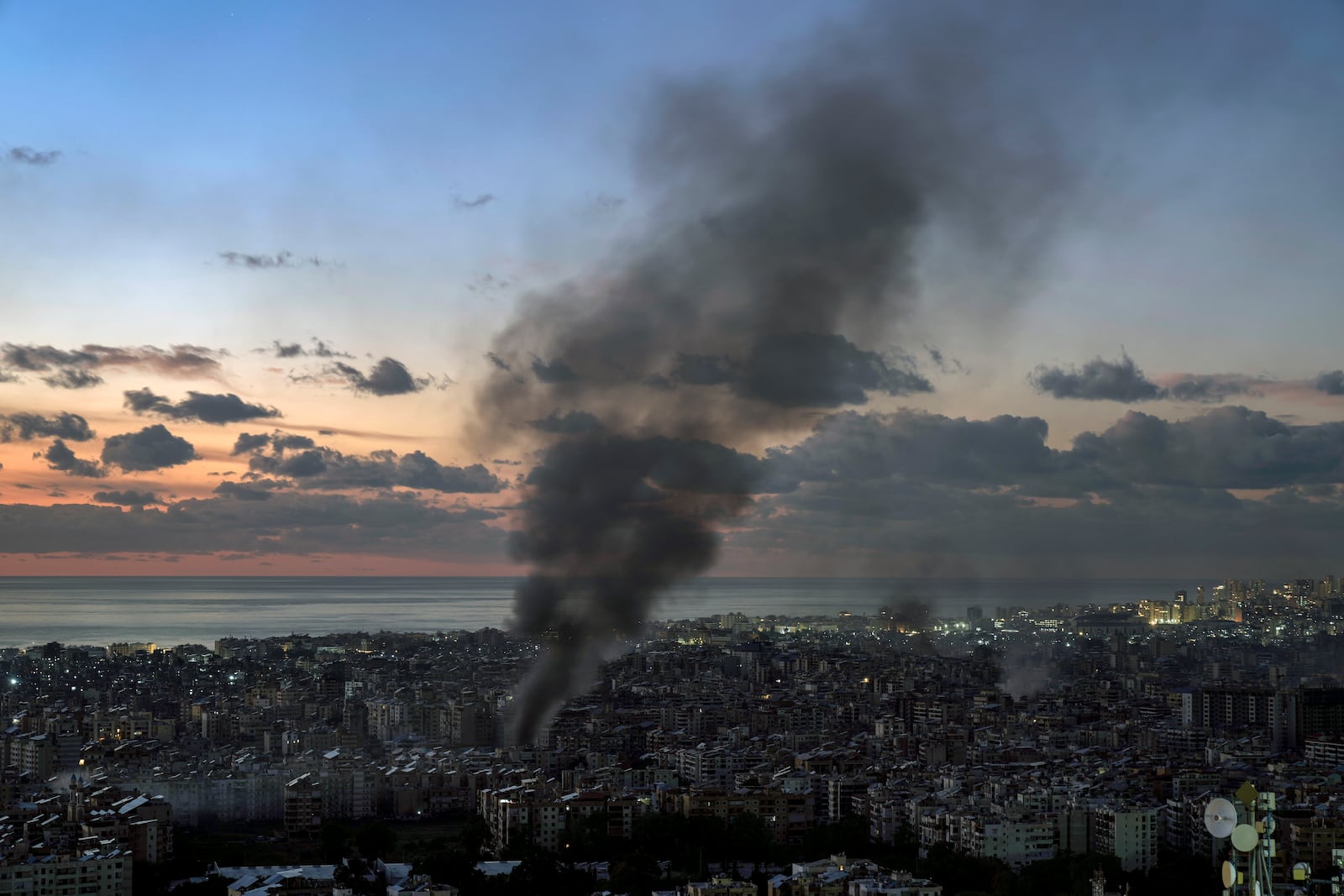 Smoke rises following an Israeli airstrike on Dahiyeh, in Beirut, Lebanon, Tuesday, Nov. 26, 2024. (AP Photo/Bilal Hussein)