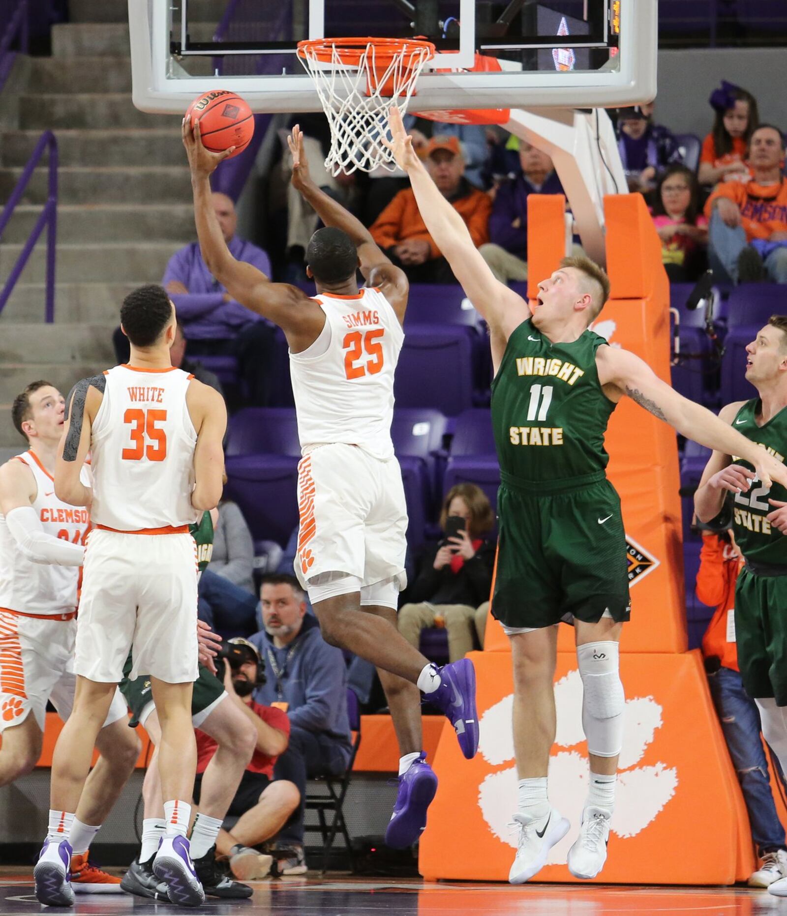 Wright State’s Loudon Love (11) goes after a shot by Clemson’s Aamir Simms (25) during Tuesday night’s NIT game at Littlejohn Coliseum in Clemson, S.C. Clemson won 75-69. PHOTO COURTESY OF CLEMSON ATHLETICS