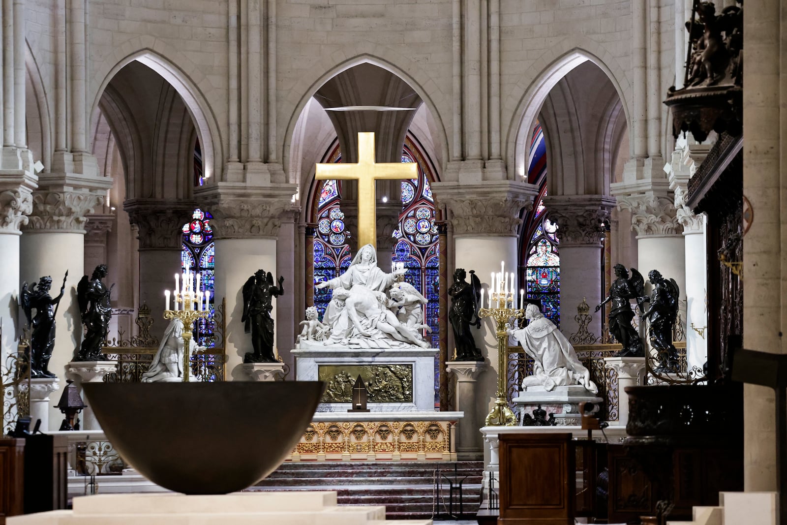 The altar designed by French artist and designer Guillaume Bardet is seen in the heart of Notre-Dame de Paris cathedral while French President Emmanuel Macron visits the restored interiors of the monument, Friday Nov. 29, 2024, in Paris. (Stephane de Sakutin, Pool via AP)