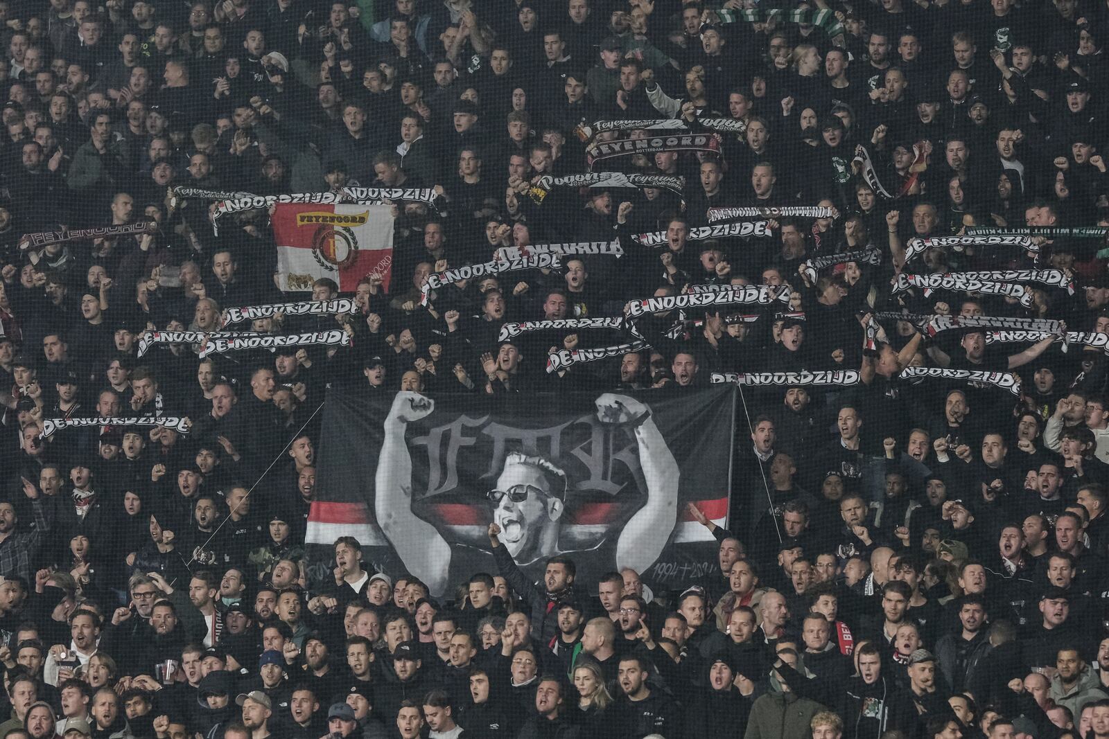 FILE - Feyenoord's fans chant slogans before the start of the Champions League opening phase soccer match between Feyenoord and Salzburg, in Rotterdam, Netherlands, Wednesday, Nov. 6, 2024. (AP Photo/Patrick Post, File)