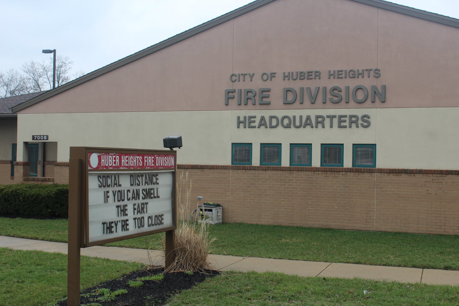 A sign outside of Huber Heights Fire Division Headquarters and Station 22 reads: “Social Distance: If you can smell the fart, they’re too close.”