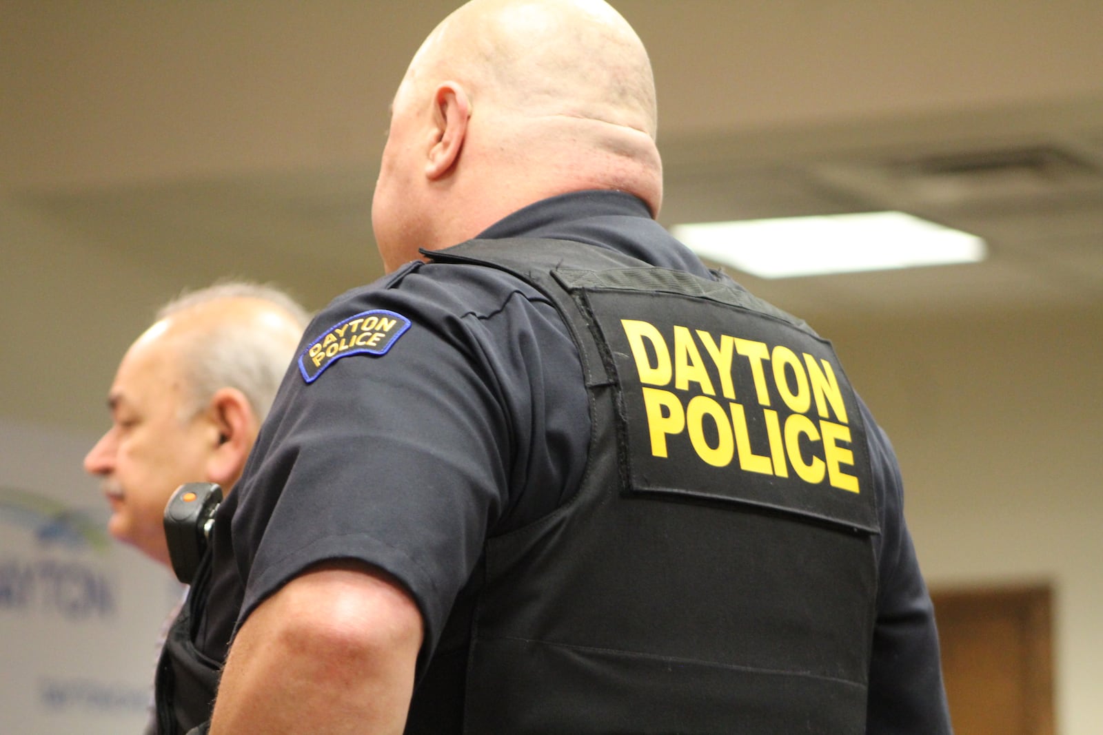 Dayton police officials at a Dayton City Commission meeting. CORNELIUS FROLIK / STAFF