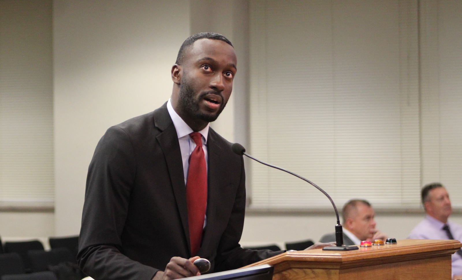 Darius Beckham, senior policy aide in the Dayton mayor’s office, gives a presentation about proposed changes to the city's Use of Force Committee ordinance on Nov. 8, 2023. CORNELIUS FROLIK / STAFF