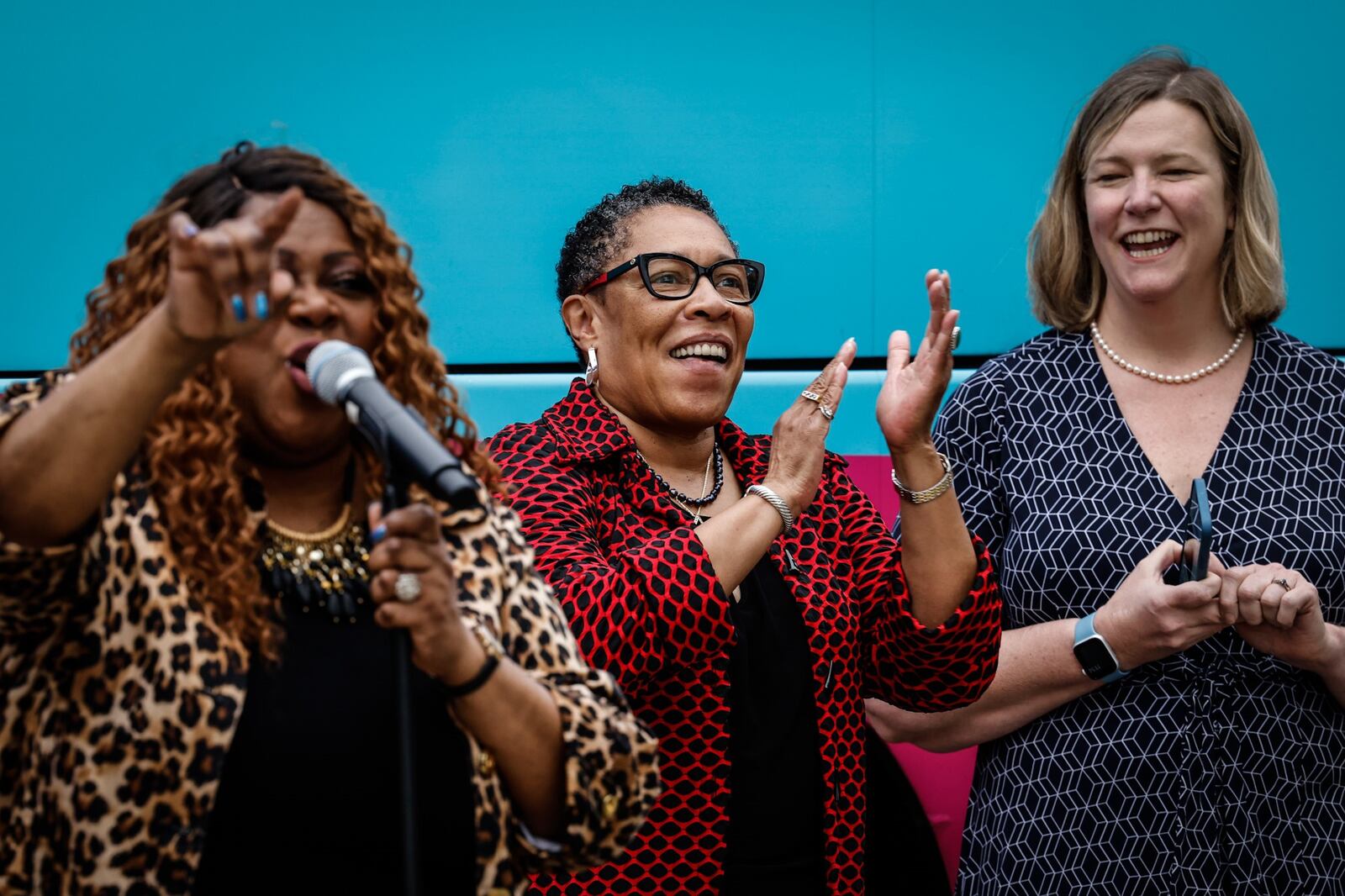 Dayton singer, Shirley Murdock (left) wrote a song about getting vaccinated which she performed during HUD Secretary Marcia Fudge's (center) visit to a West Dayton clinic on Friday. Dayton Mayor Nan Whaley also attended.