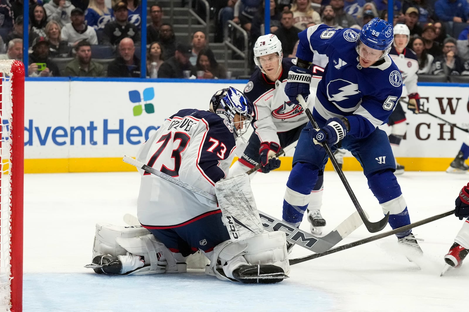 Tampa Bay Lightning center Jake Guentzel (59) watches his shot get past Columbus Blue Jackets goaltender Jet Greaves (73) for a goal during the second period of an NHL hockey game Tuesday, Dec. 17, 2024, in Tampa, Fla. (AP Photo/Chris O'Meara)