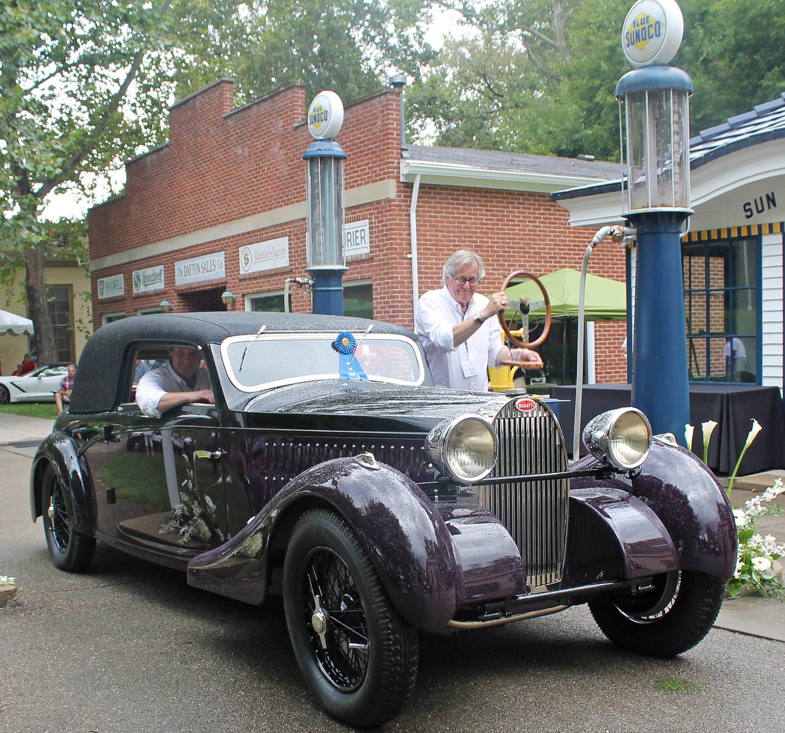 This Bugatti Type 57 Binder Coupe, shown here with owner Richard Grant III, took Best of Show honors at the 2016 Dayton Concours and Cincinnati Concours. Contributed photo Haylie Reed / Dayton History

