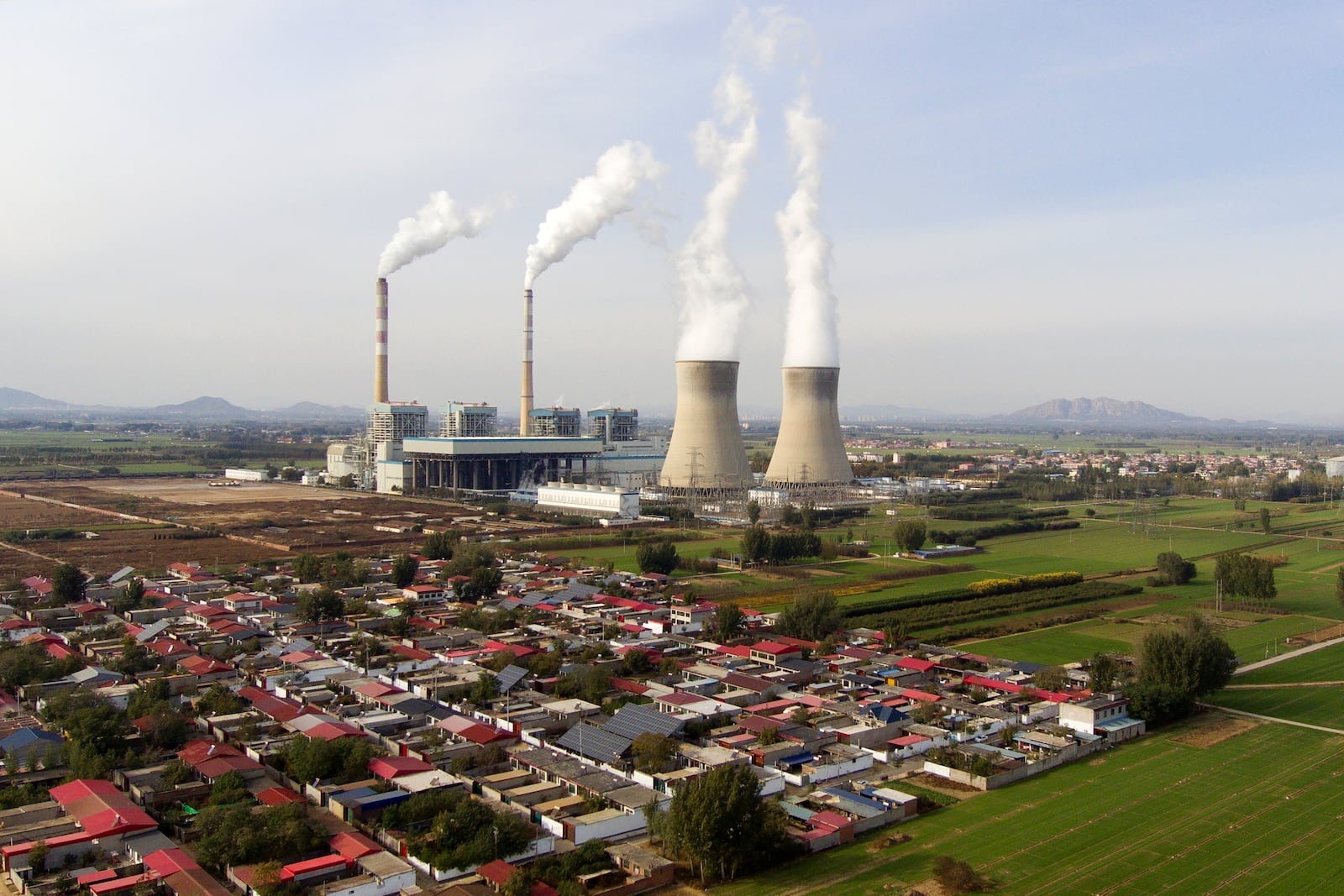 FILE - Guohua Power Station, a coal-fired power plant, operates in Dingzhou, Baoding, in the northern China's Hebei province, Nov. 10, 2023. (AP Photo/Ng Han Guan, File)