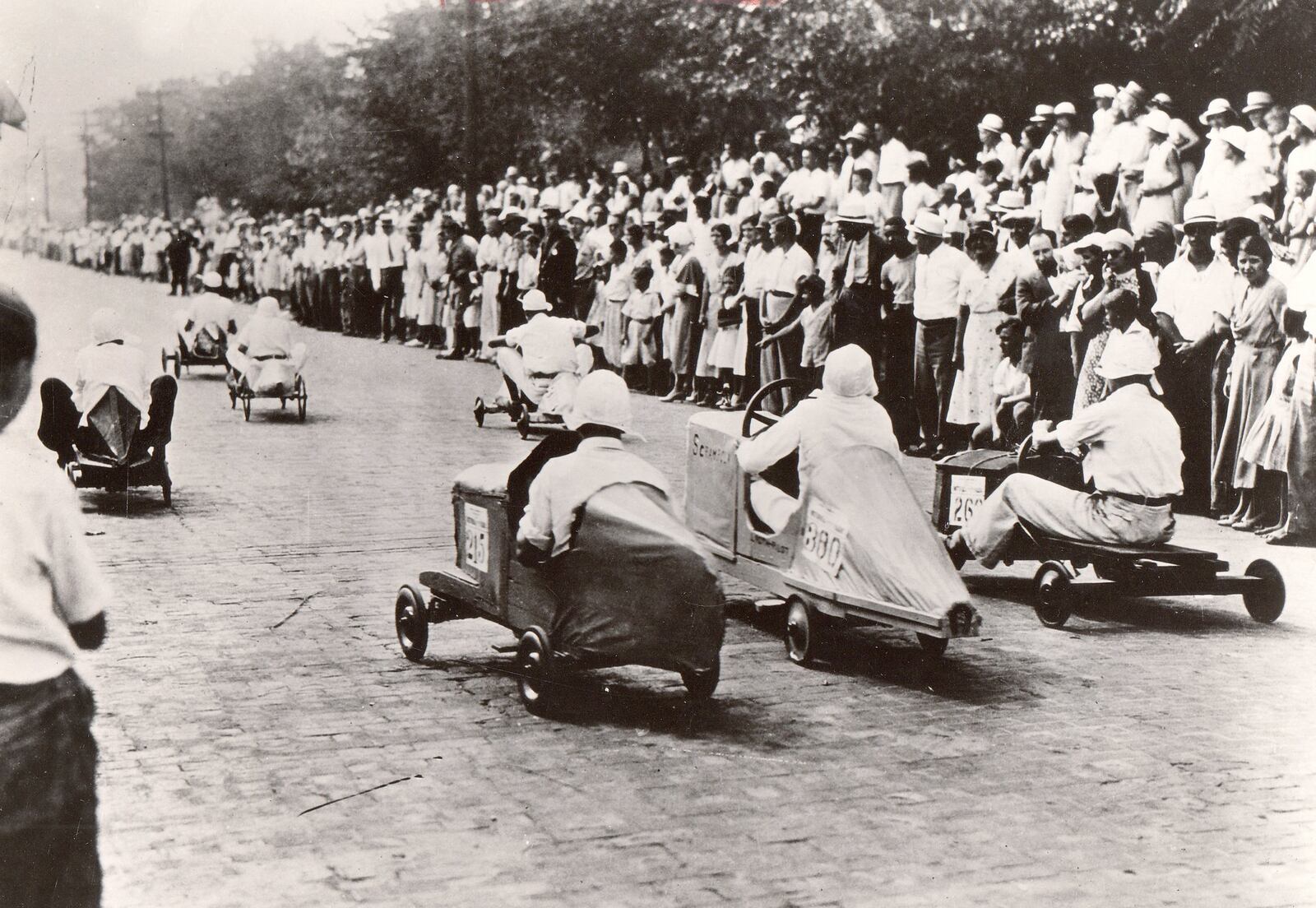 Soap box drivers take off at the start of a heat at the top of Burkhardt Avenue in 1933. DAYTON DAILY NEWS ARCHIVE