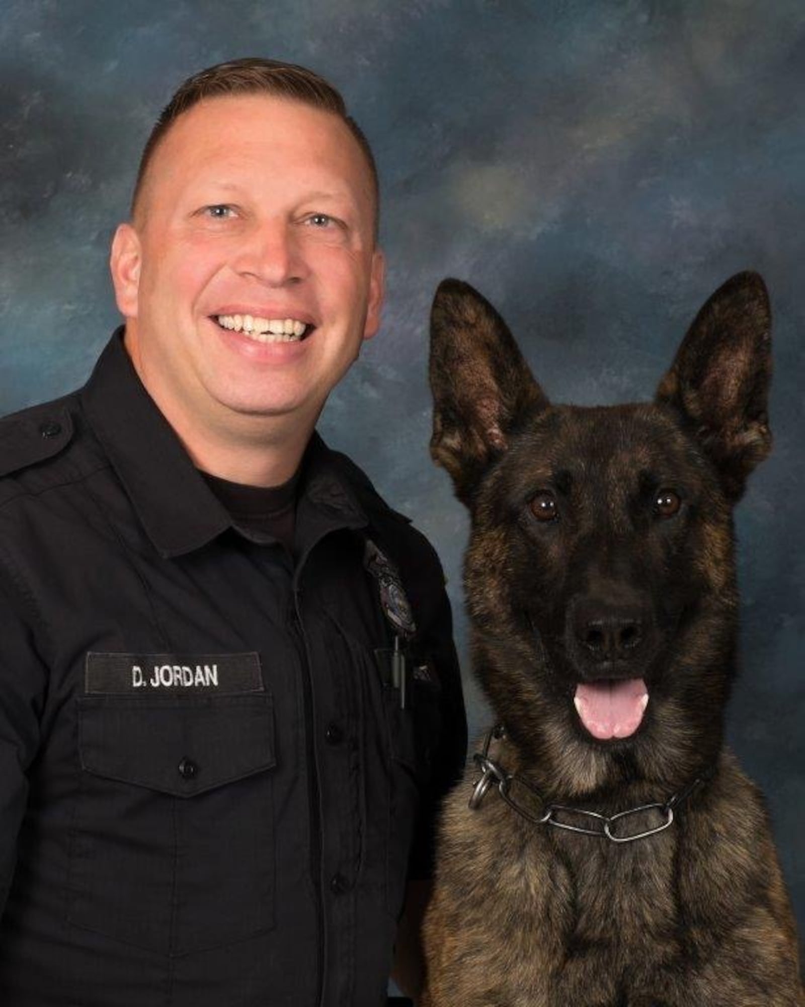 Middletown police Officer Dennis Jordan was shot after pursuing a suspect on Monday, Aug. 31, 2020, in Turtlecreek Twp. He is a K-9 officer, seen here with his partner, Koda. CONTRIBUTED