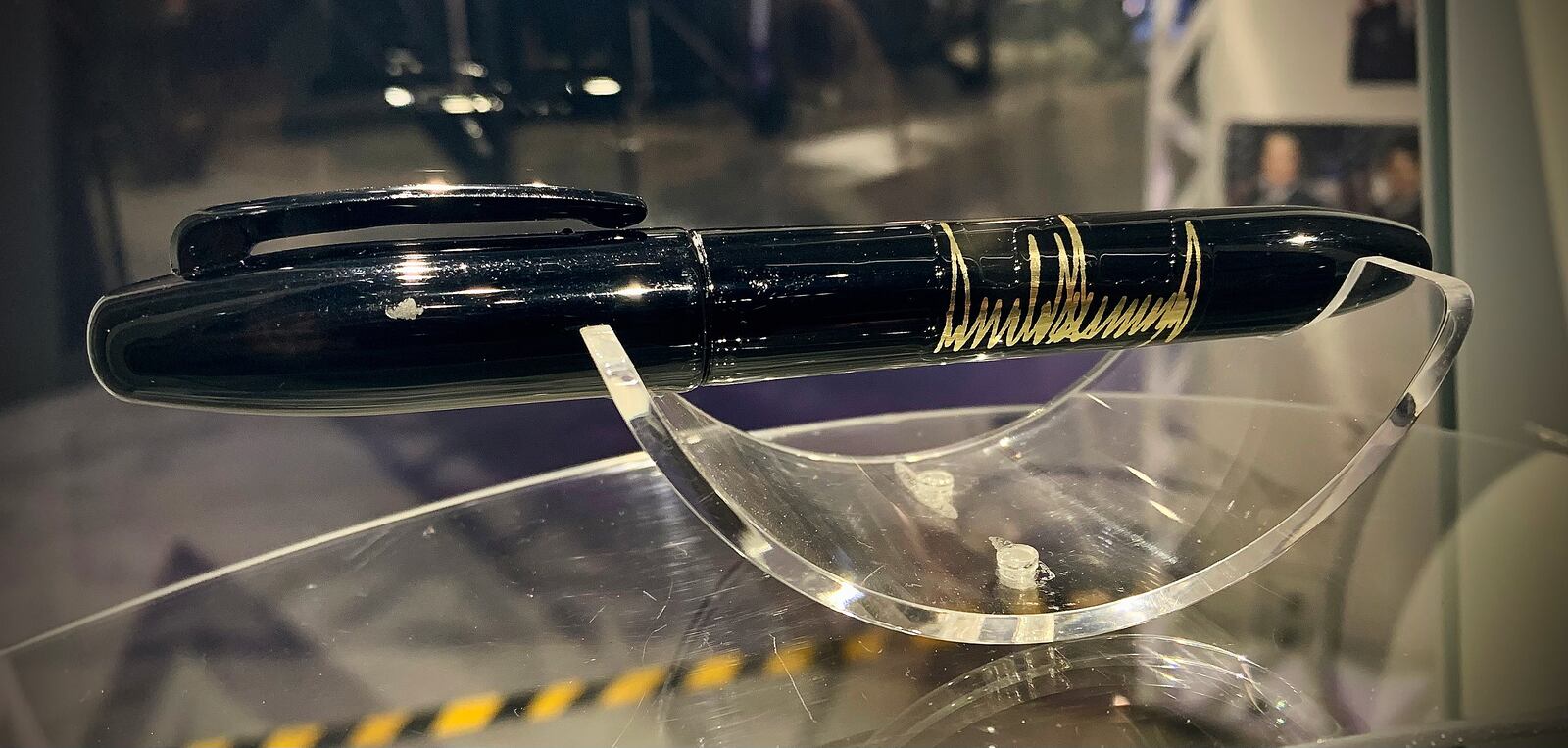 The pen former President Donald Trump used to sign in the newest branch of the American armed forces, the U.S. Space Force is on display at the National Museum of the U.S. Air Force, for the 75th anniversary of the Department of the Air Force. MARSHALL GORBY\STAFF