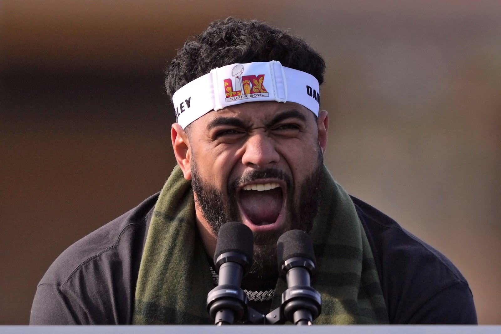 Philadelphia Eagles offensive tackle Jordan Mailata speaks during the team's NFL football Super Bowl 59 parade and celebration, Friday, Feb. 14, 2025, in Philadelphia. (AP Photo/Matt Rourke)