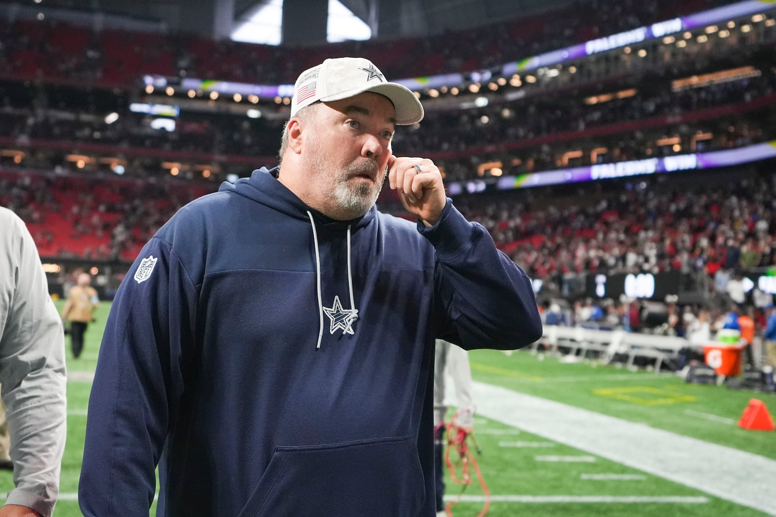 Dallas Cowboys head coach Mike McCarthy walks off the field after an NFL football game against the Atlanta Falcons, Sunday, Nov. 3, 2024, in Atlanta. The Falcons won 27-21. (AP Photo/ Brynn Anderson)