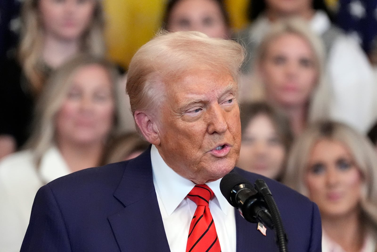 President Donald Trump speaks before signing an executive order barring transgender female athletes from competing in women's or girls' sporting events, in the East Room of the White House, Wednesday, Feb. 5, 2025, in Washington. (AP Photo/Alex Brandon)