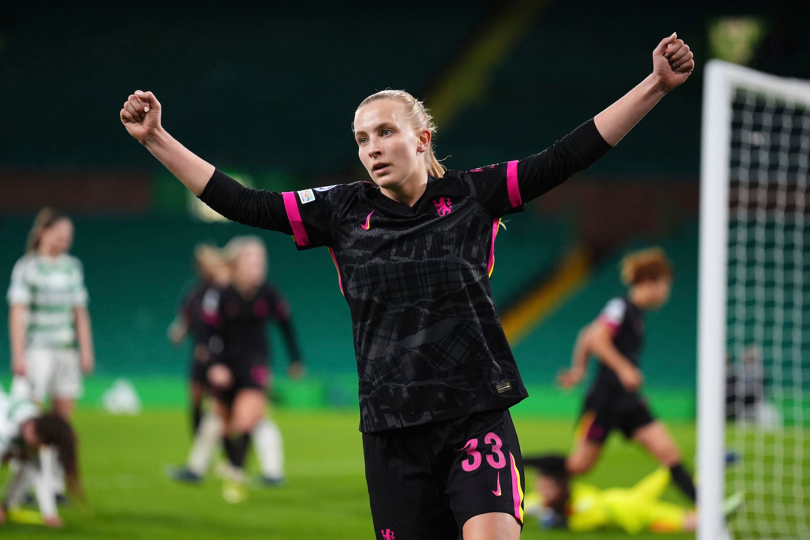 Chelsea's Aggie Beever-Jones celebrates providing the assist for Maika Hamano to score their first goal of the game, during the Women's Champions League, group B soccer match between Celtic Women and Chelsea Women, at Celtic Park, Glasgow, Scotland, Wednesday Nov. 13, 2024. (Andrew Milligan/PA via AP)