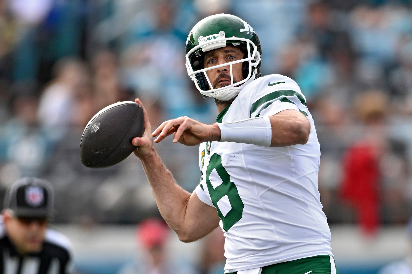 New York Jets quarterback Aaron Rodgers (8) throws a pass against the Jacksonville Jaguars during the second half of an NFL football game Sunday, Dec. 15, 2024, in Jacksonville, Fla. (AP Photo/Phelan M. Ebenhack)