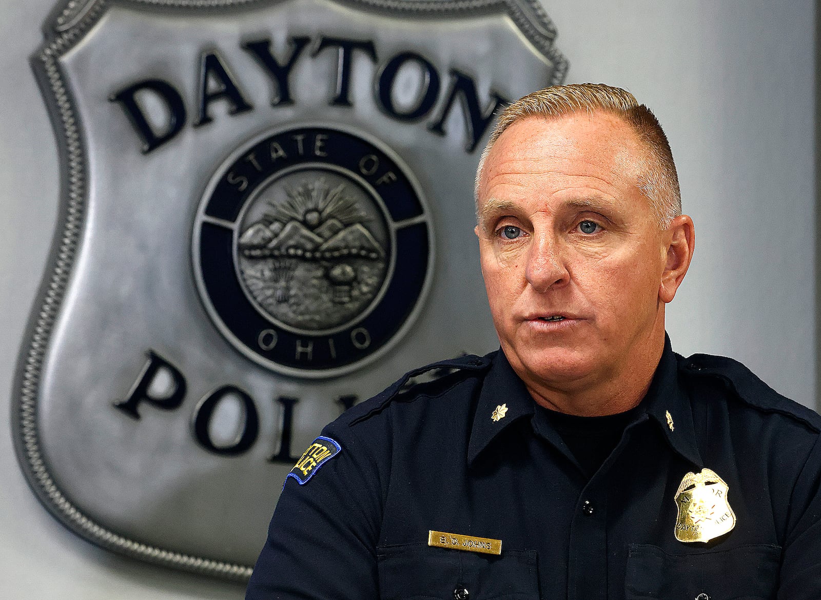 Dayton Police Maj. Brian Johns held a press conference Thursday, Nov. 14, 2024 to update the pubic on a fatal shooting at the RoadDog Convenience store on James H. McGee Boulevard. MARSHALL GORBY\STAFF