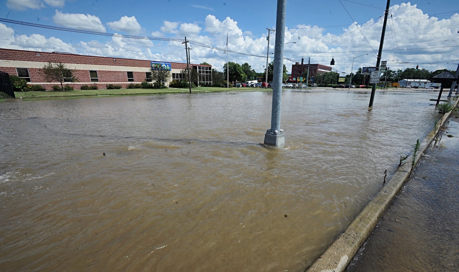 A water main break involving a 48-inch pipe at Keowee Street and Monument Avenue on Monday affected businesses in the area. MARSHALL GORBY/STAFF