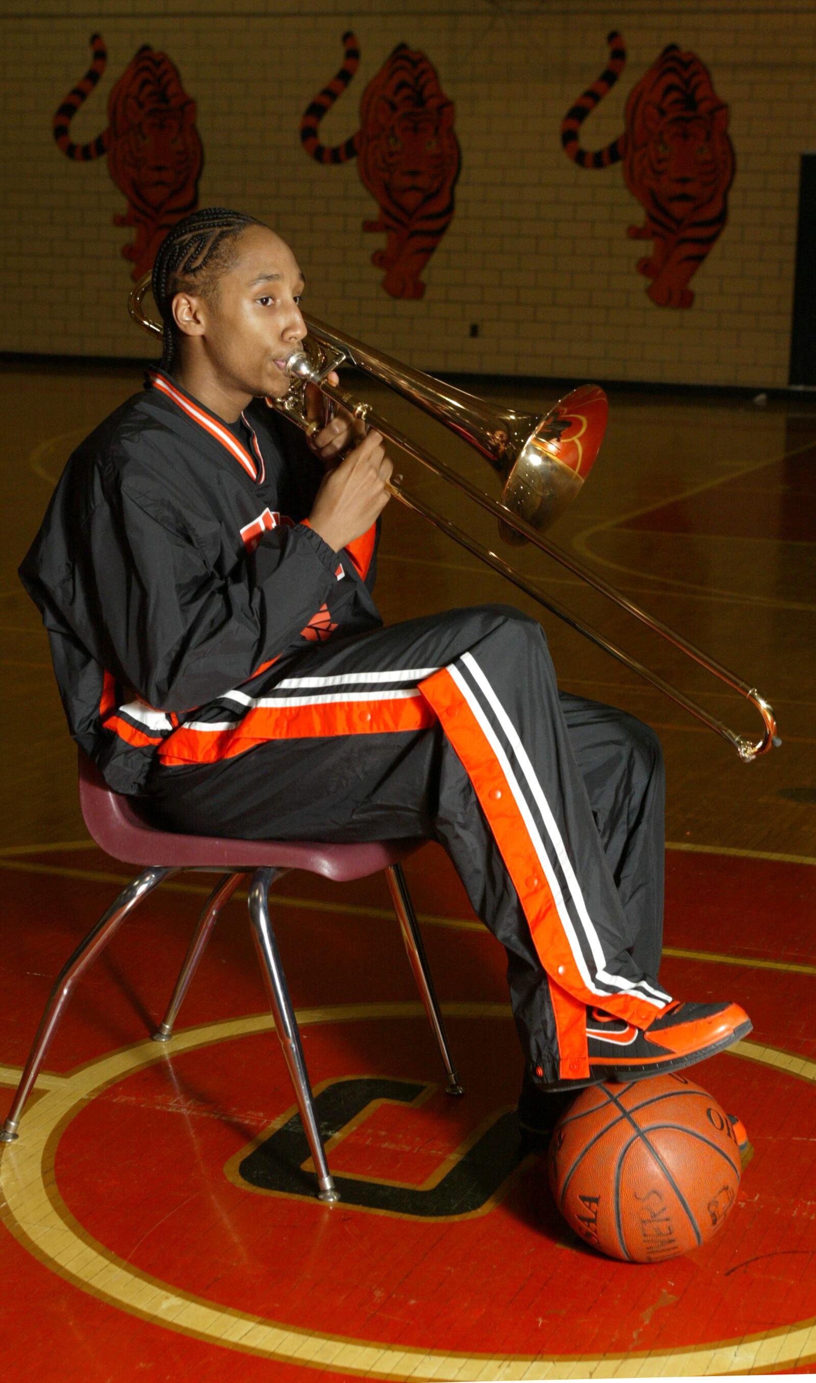 2/1/05 -- ddn0207heflinp -- Stivers School for the Arts senior Quincy  Heflin excels with both hoops and horns. Heflin plays trombone at the school known for its fine musicians as well as guard/forward for the Tigers' basketball team. DDN FILE PHOTO