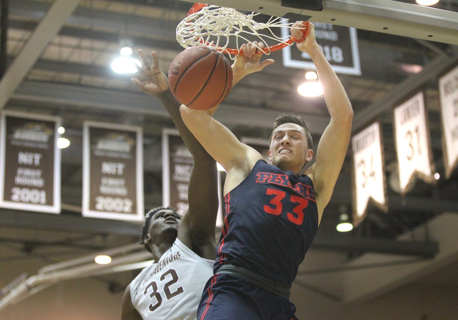 Dayton’s Ryan Mikesell dunks against St. Bonaventure on Saturday, Jan. 19, 2019, at the Reilly Center in Olean, N.Y. David Jablonski/Staff