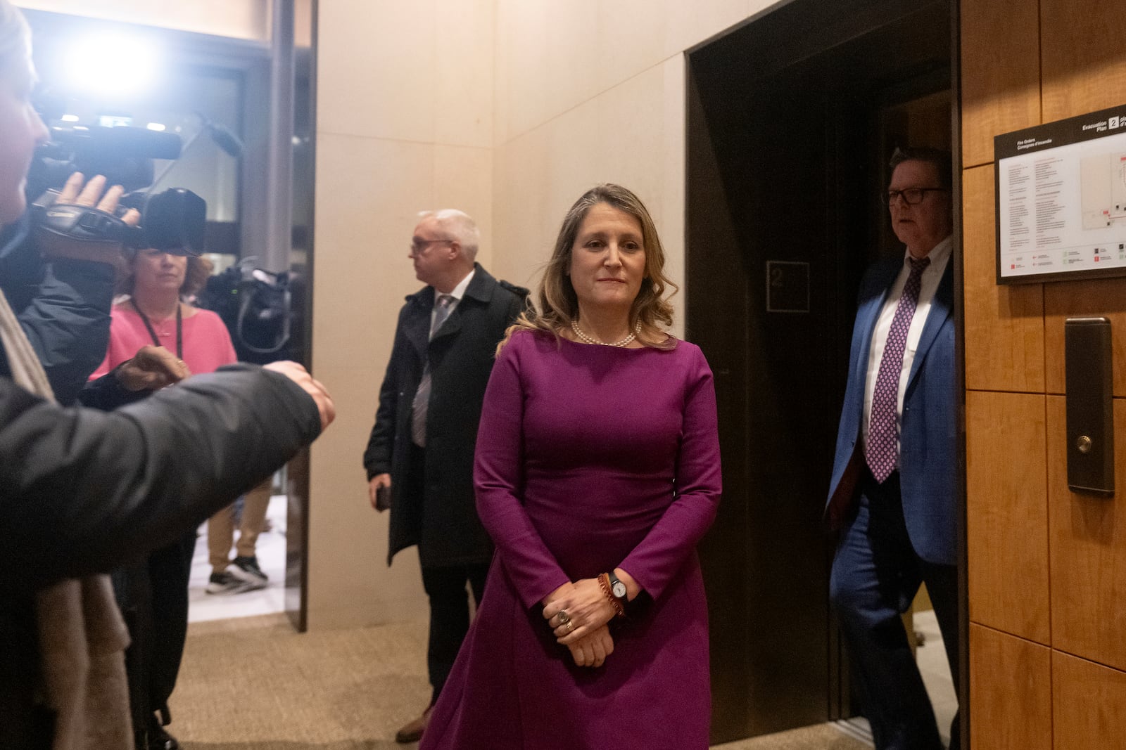 Chrystia Freeland, who today stepped down as finance minister and deputy prime minister, arrives for a national caucus meeting, in Ottawa, Ontario, Monday, Dec. 16, 2024. (Spencer Colby/The Canadian Press via AP)