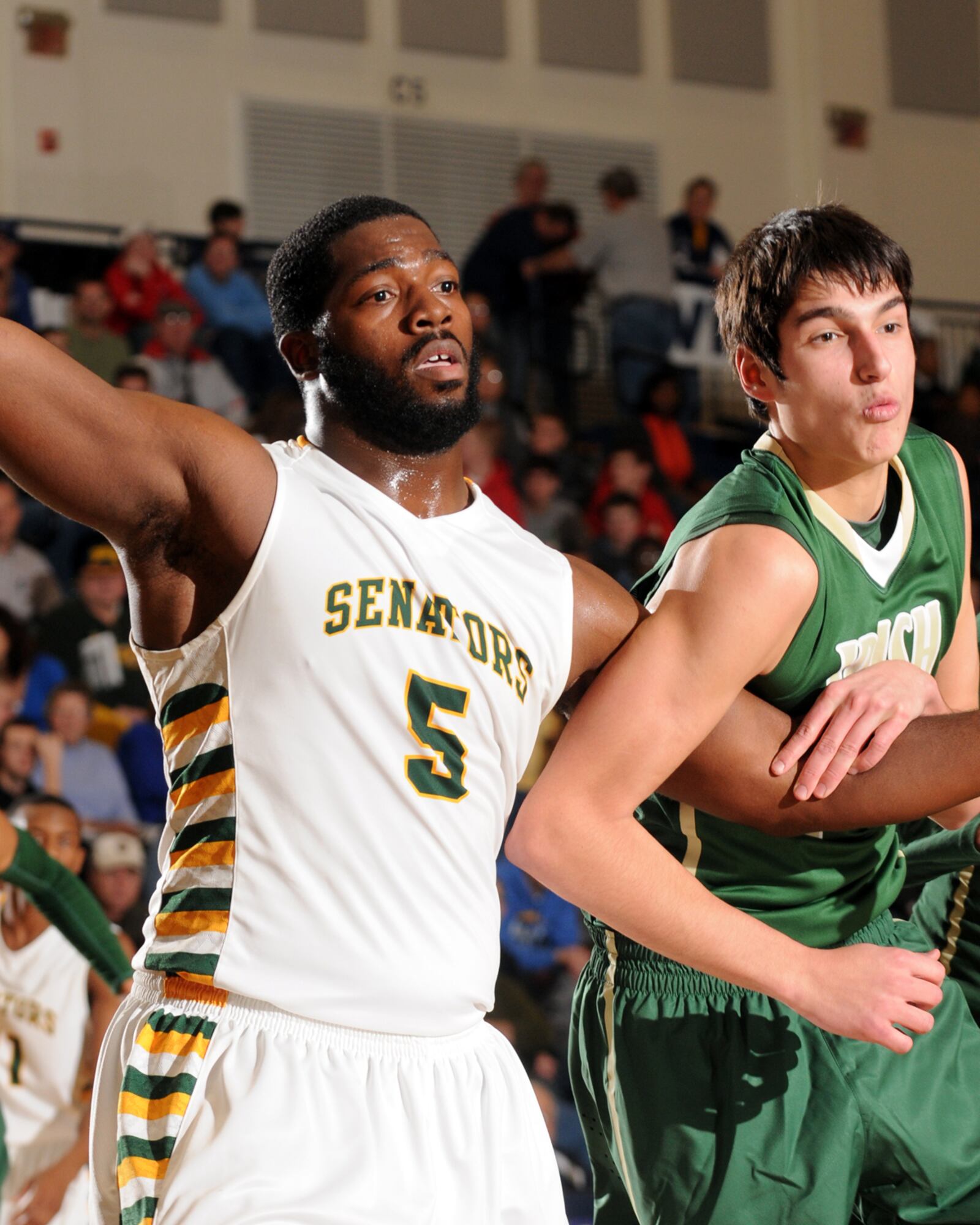 Before becoming an All-American defensive lineman at Ohio State and a member of the Buffalo Bills, Adolphus Washington was a standout basketball player in Cincinnati.