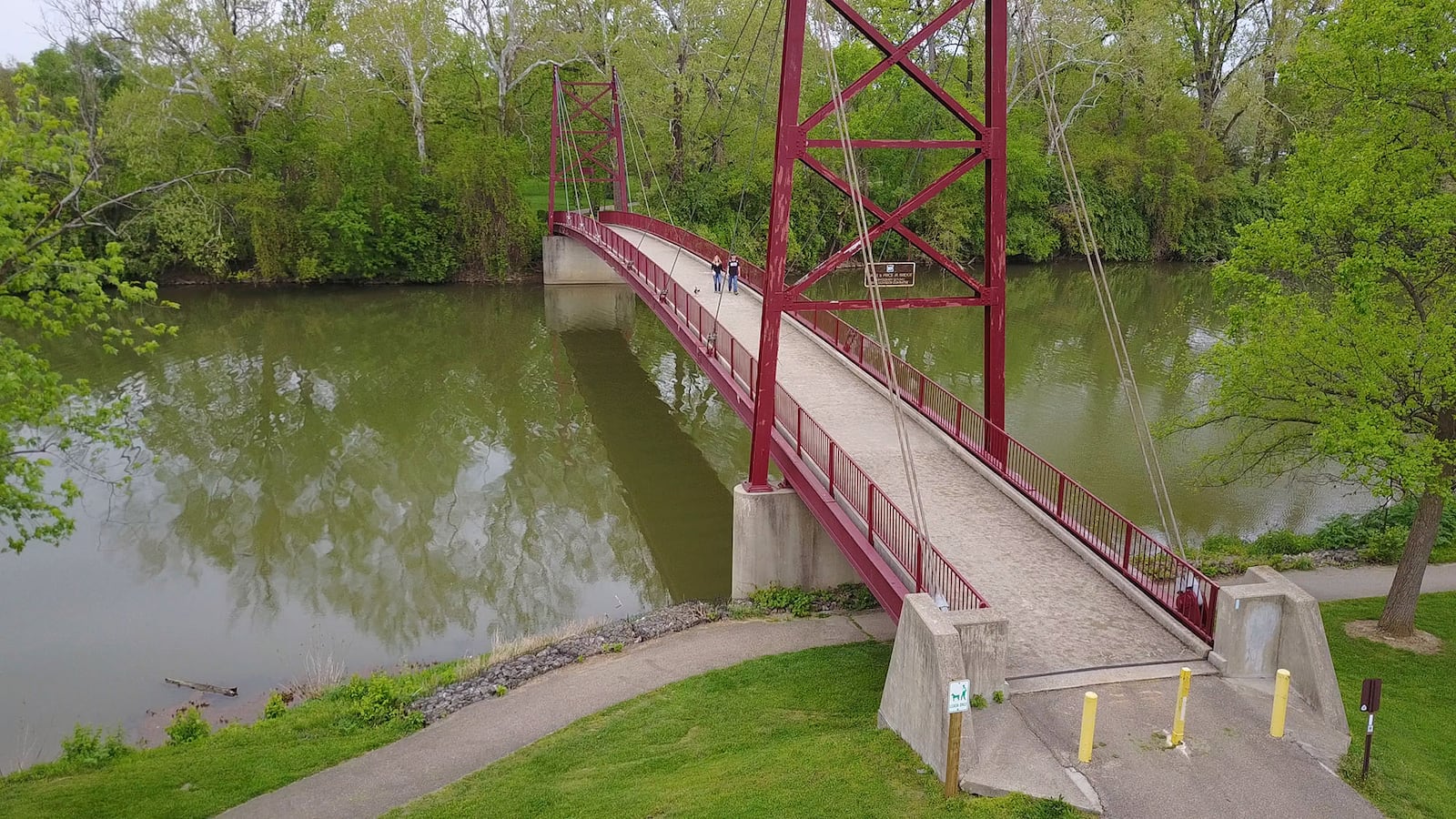 The Gayle B. Price Jr. Bridge, shown in a 2017 photo, spans the Great Miami River to connect Island MetroPark with Triangle Park.    STAFF FILE PHOTO